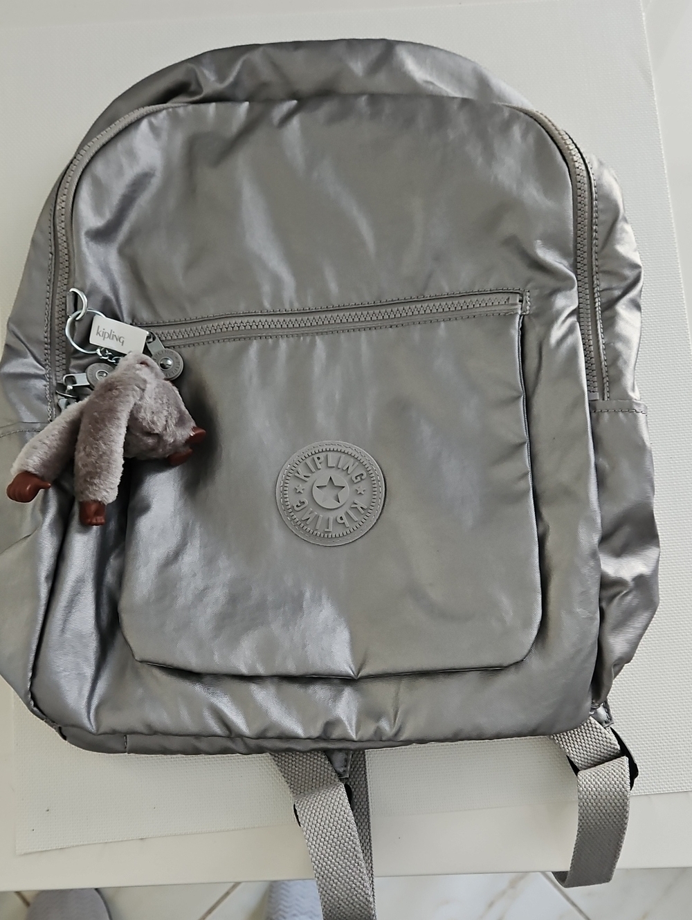 Kipling Metallic Silver Nylon Backpack with Monkey Keychain